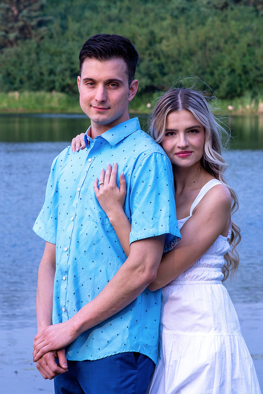 Couple showcasing coordinated, comfortable outfits for an engagement photo shoot, emphasizing personal style and comfort