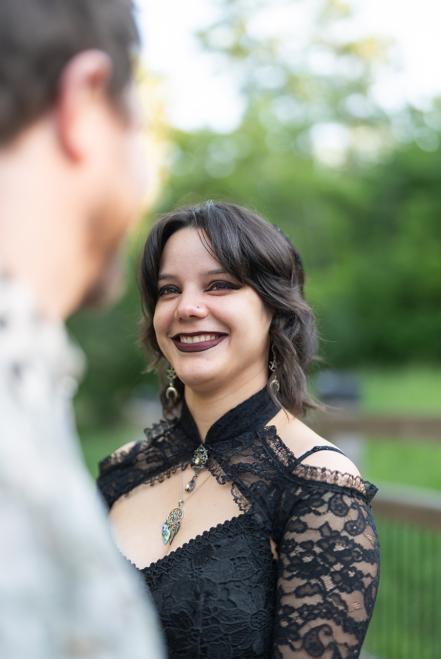 bride-to-be-smiling-at-groom-mill-creek-engagement-edmonton