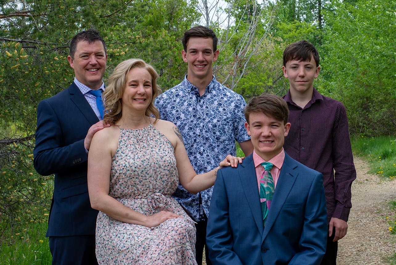Family of 3 boys during graduation