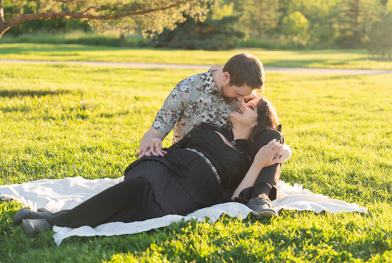 couple-laying-on-blanket-sunset-engagement-edmonton